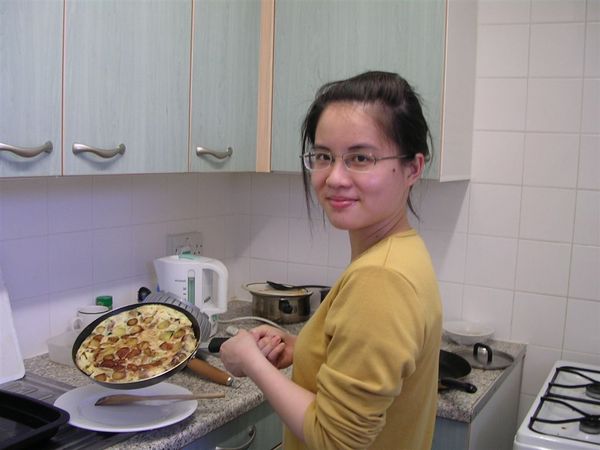 Bonnie cooking Spanish omelette.JPG