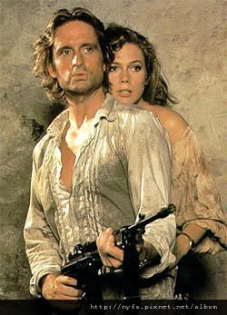 Michael-Douglas-and-Kathleen-Turner-in-Romancing-the-Stone-1984-Movie-Image.jpg