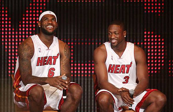 11033207-lebron-james-dwyane-wade-2010-miami-heat-introduction-photo-medium