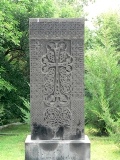Genocide Memorial Complex - cross stone.JPG