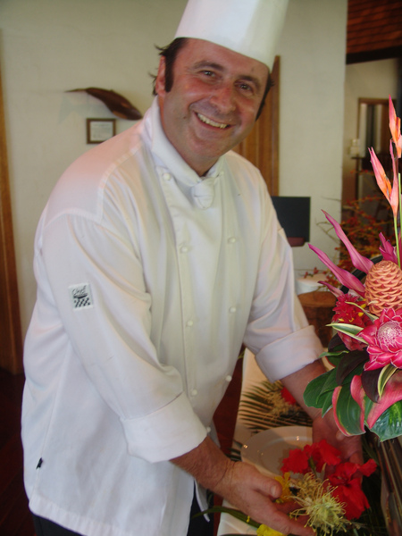 executive chef  Herbie Gerzer arranging flowers at Thala Beach Lodge.jpg