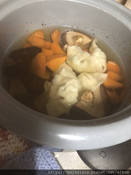 Mushroom and carrots soup with dumplings