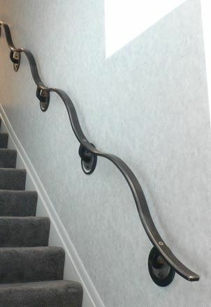 Blacksmith _ Custom Designed Handrail _ Hand Forged Steel and Stainless Steel.jpg