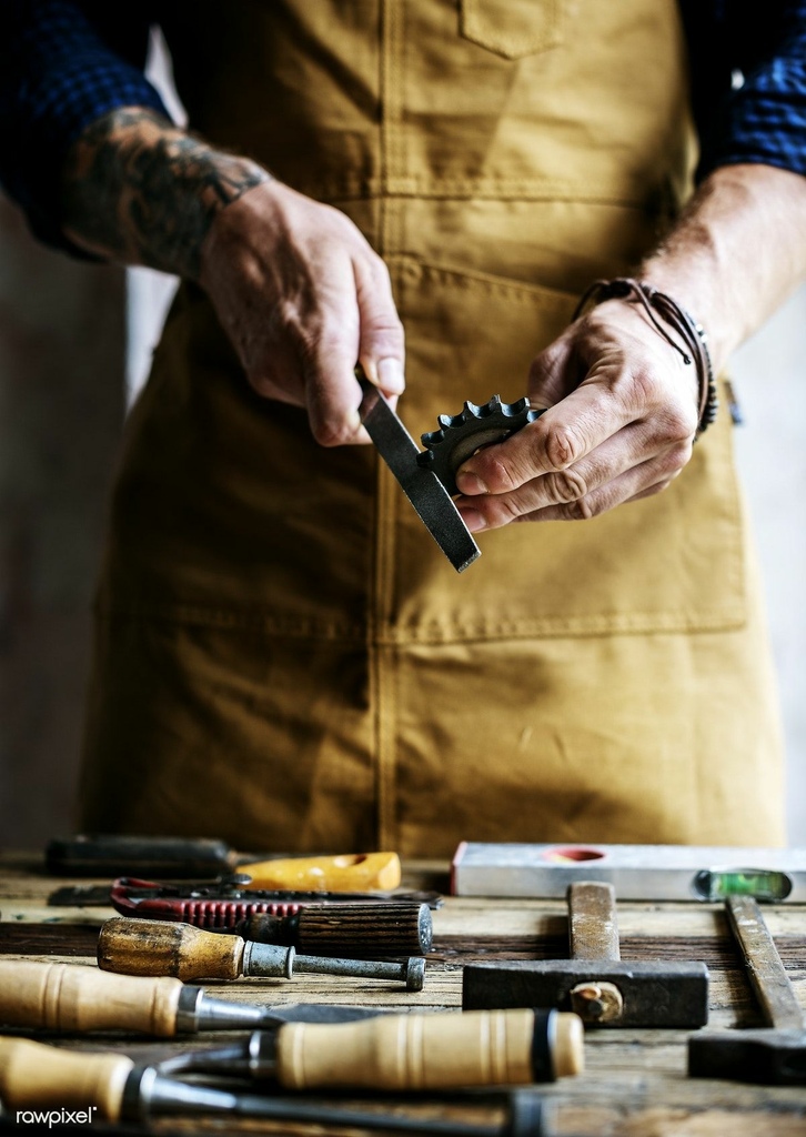 Download premium image of Closeup of carpenter working with his tools 94041.jfif