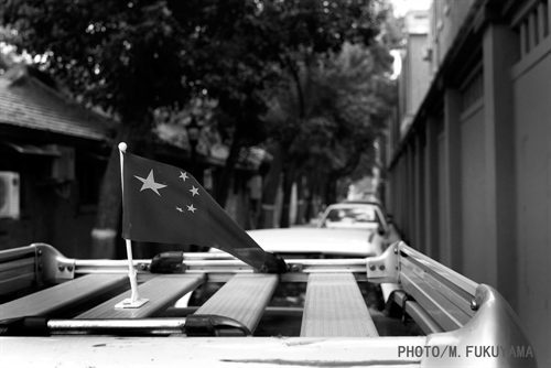 Beijing Hu-Tong with PRC Flag.jpg