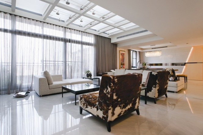 Modern-living-room-cow-hide-chairs-665x442.jpg Modern-living-room-cow-hide-chairs-665x442.jpg