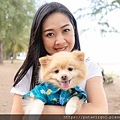 happy-woman-is-holding-pomeranian-dog
