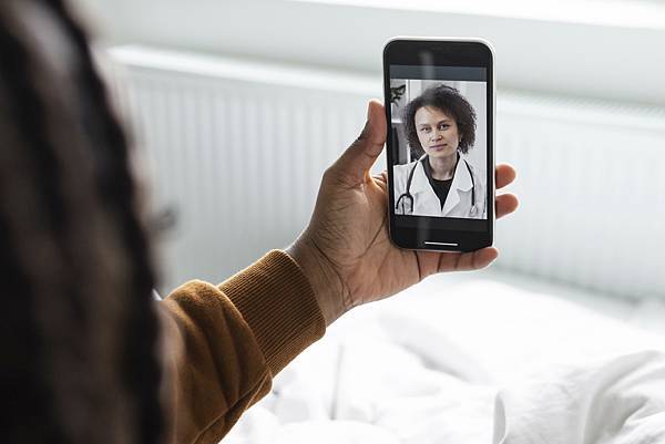 sick-man-having-video-call-with-doctor.jpg