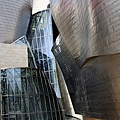 2.399px-The museum is clad in glass, titanium, and limestone