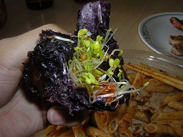 sea-weed roll with sprouts