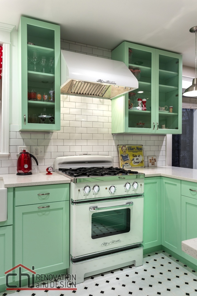 A-bold-mint-green-kitchen-in-combination-with-a-retro-stove.jpeg