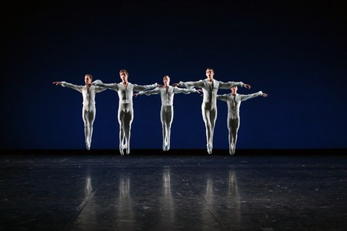 5 men jump in air 5 men jump in air