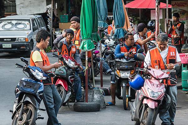 motorbike-taxi-queue-bangkok-thailand-may-orange-jacket-huay-kwang-market-70950387.jpg