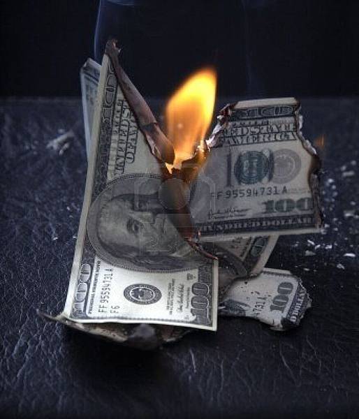 5041370-burning-of-money-on-fire