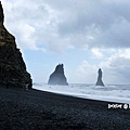 Black lava sand coast line