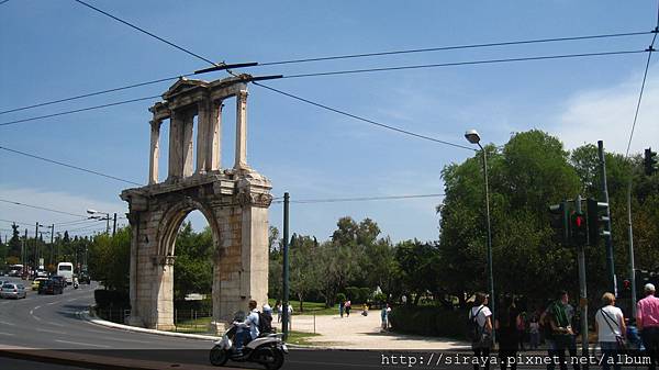 riding past the 2000-year-old gate