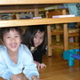 02 We are "under" the table.