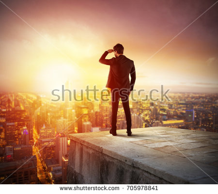 stock-photo-businessman-looking-to-the-future-for-new-business-opportunity-705978841.jpg