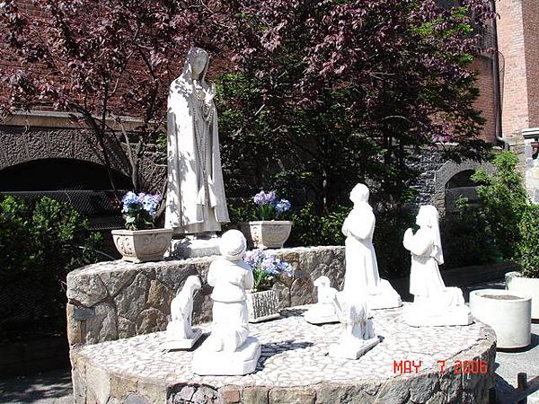 sculptures in front of a churc