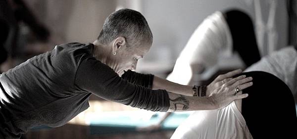 Yoga+teacher+training+mentor+Nina+Be+assists+student+in+downward+dog+with+hands+on+adjustments.jpeg Yoga+teacher+training+mentor+Nina+Be+assists+student+in+downward+dog+with+hands+on+adjustments.jpeg