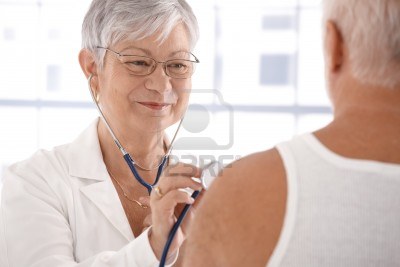 10389951-senior-female-doctor-examining-male-patient-smiling