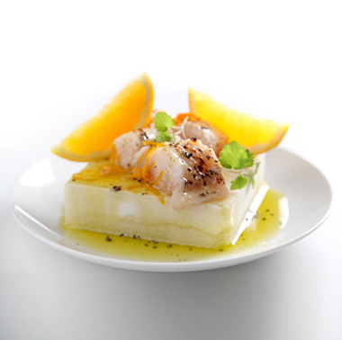 Escallop of amberjack caramelised in citrus fruits on cervia sweet sea-salt block and Olitalia - Colline di Romagna (P.D.O.) extra virgin olive oil