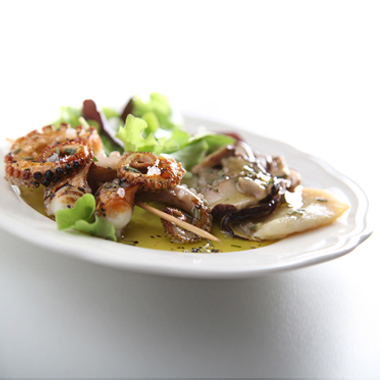 Pan-fried fillet of turbot with porcini mushrooms from the Alto Savio valley flavoured with Olitalia - Terra di Bari (P.D.O.) extra virgin olive oil and Roasted octopus kebabs in rosemary and coarse sea-salt from Cervia