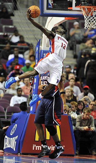 Will Bynum skies a dunk that did not count in the fourth quarter because he palmed the ball..jpg