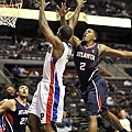 Hawks guard Joe Johnson defends a drive by Rodney Stuckey in the third quarter..jpg