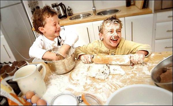 messy-kids-cooking-in-kitchen