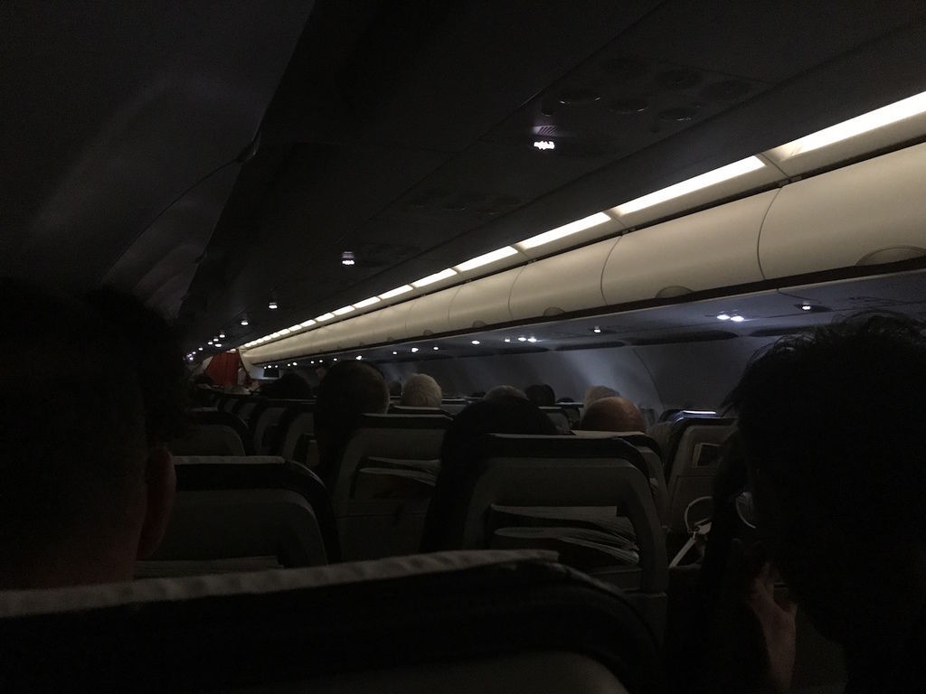 IMG_4201 2320h Lights Dimmed Further (2258 Doors Closed 2309 Taxi Off (No Push Back) 2314 Crew be Seated 2315 Take Off 2320 Signs Off).JPG