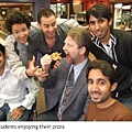 ELS student enjoying the pizza.JPG