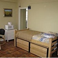 Men's dorm- single bed room.JPG
