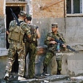 Russian SOBR unit performing a house sweep after a 3hr battle with Chechen militants in Grozny, May 2000..jpg