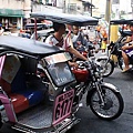 Wegoeducation-Trike-w-Phil-flag..crowding-the-streets_DCE.jpg