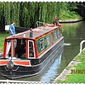 James is helping someone to open the gate of canal