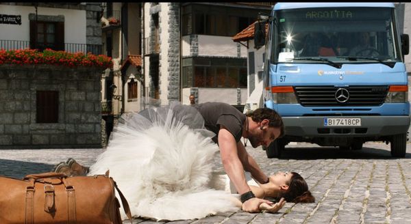 SPANISH_AFFAIR_-man_pinning_ballerina_to_ground_bus_approaches_600