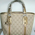 GUCCI-139261小號金色吊鈴鐺公仔包尺寸H18W25D11CM.~2600