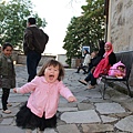 Carolina playing with a kid at Golden Lane, Prague Castle