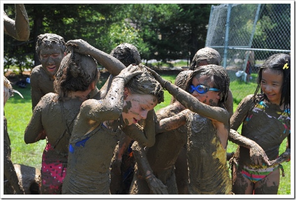 Everyone dives into mud for mud madness..Photographed by Emily Chow