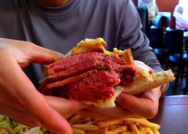 Piled smoked meat sandwich