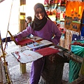 Bedouin girl knitting