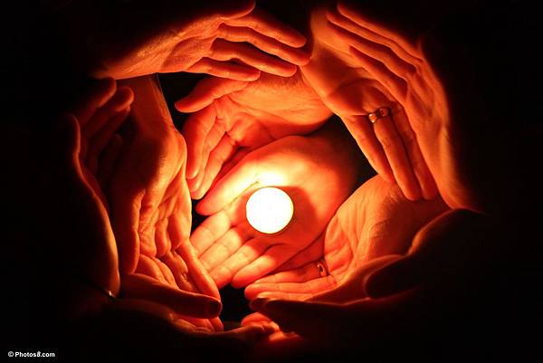 candle_surrounded_with_many_hands-other candle_surrounded_with_many_hands-other